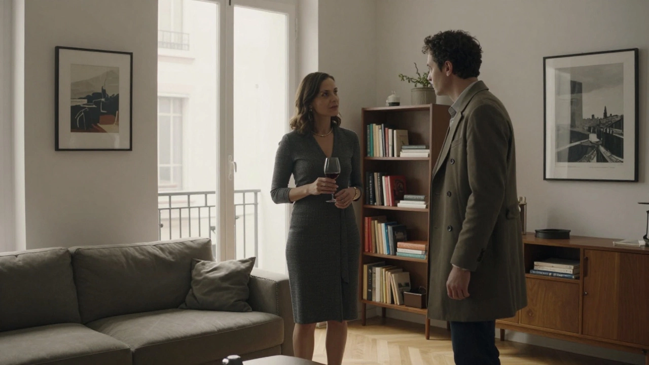 A man and woman engaging in thoughtful dialogue in a minimalist Paris apartment.